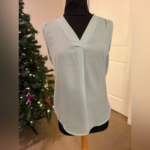 Light teal blouse
